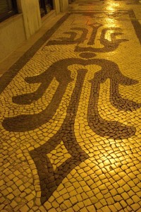 Classic black and white tile of Lisbon streets.